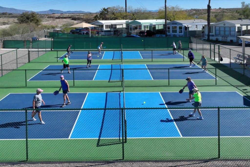 Residents enjoying social activities in a 55+ RV community clubhouse